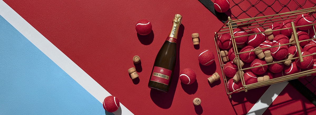 Piper-Heidsieck - Cuvee Brut on tennis court